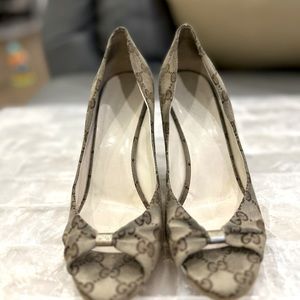 Gucci peep toe wedge. Cork heel Size 8 1/2. Heavily worn.